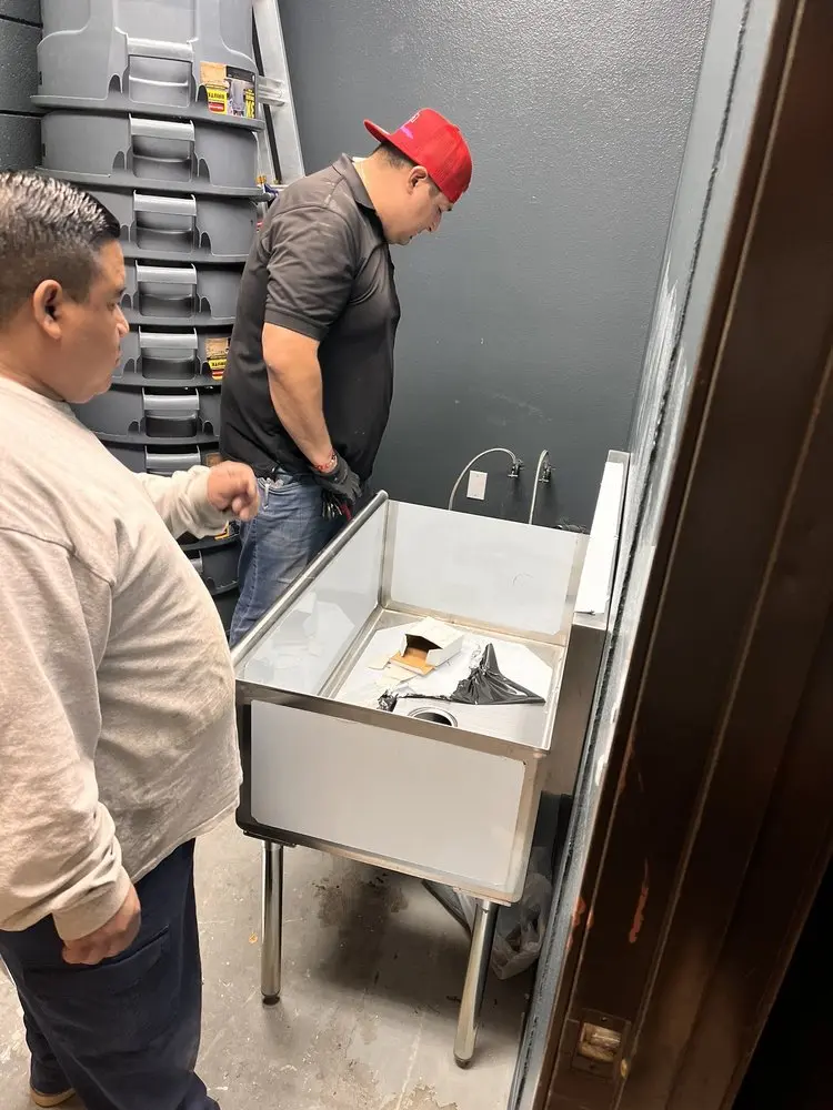 Commercial plumbing and sink installation in Crescent Heights